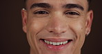 Dental hygiene, smile and man in studio, face and wellness  with confidence on dark background. Portrait, happiness and person with oral health, fresh breath and pride with teeth whitening or results