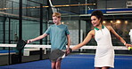 Woman, teaching and helping boy for padel lesson, instructions and demonstration on court. Coach, explain and teen with racket guidance for technique, sports tips and learning skills of fitness game