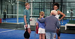 Greeting, padel and coaching with people on court for meeting, training pick up and workout. Personal trainer, grandmother and challenge with children and women in sports club for teaching and team