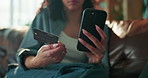 Home, credit card and woman with cellphone, hands and banking with transaction. Online shopping, ecommerce and person with savings, smartphone and  with consumer, fintech and investment with payment