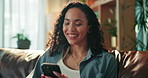 Woman, phone and smile with texting on sofa, contact and web chat for online dating in lounge at home. Person, smartphone and check notification with mobile app, scroll and social network at house