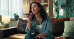 Voice recognition, phone and woman on sofa in home for communication, networking or connectivity. Cellphone, talking and female person on mobile conversation with loudspeaker in living room at house.