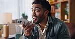 Phone call, recording and relax with man on sofa for communication, contact and discussion. Networking, connection and reminder with person and mobile in living room of home for conversation