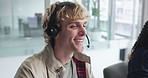 Call center, smile and man talking for help desk, tech support or coworking with software feedback. Contact us, headset and agent consulting for IT solution, customer service or laugh with funny joke