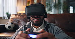 Home, vr goggles and man with video game, controller and entertainment with happiness. Apartment, gamer or person on couch, augmented reality or glasses with fantasy, click or futuristic ux in lounge