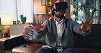Futuristic, simulation or man with VR headset on sofa for user experience, interactive or metaverse. Happy, gamer and 3D glasses in home for online gaming, virtual reality entertainment or innovation