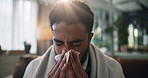 Sick man, flu and blowing nose with tissue for sneeze, sinus or virus symptoms in home. Male person, viral infection or allergy with toilet paper or blanket for fever, mucus or influenza in house