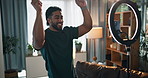 Happy man, vlogger and dancing with ring light for video recording or live streaming in home. Influencer, male person and dancer with energy, vibe or phone for content creation or online challenge
