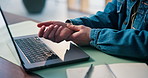 Laptop, wrist pain and man in office with carpal tunnel, injury or accident with typing for project. Startup, computer and male copywriter with hand strain, ache or joint discomfort in workplace.