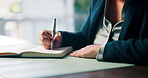 Office, writing and hands with book, desk and lawyer with information for criminal case or research. Law firm, attorney and person with legal document for trial, notes and planning with investigation