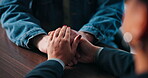 Psychologist, patient and holding hands in therapy with support for trauma, diagnosis or empathy. Mental health, people and console in counseling for bad news, grief and compassion for loss in clinic