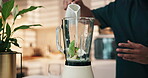 Blender, hands and ingredients with person in kitchen of home for breakfast, diet or health. Nutrition, pouring milk and smoothie with man in apartment for drink, weight loss or wellness recipe