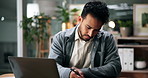 Laptop, writing notes and business man with research, bookkeeping and review information at night. Computer, notebook and serious worker with financial audit, accounting and deadline in office