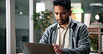 Reading, solution or businessman on laptop in office for problem solving or investment banking. Thinking, Asian auditor or professional banker in workplace with finance experience or financial report