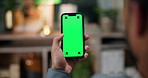 Hand, green screen and man with smartphone, internet or social media with communication. Closeup, mobile user or person with cellphone, connection or email with network, texting or message to contact