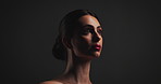 Woman, thinking and beauty in studio with results, mockup space and reflection on black background. Girl, makeup and perspective with transformation, cosmetics and red lips with glow with low angle
