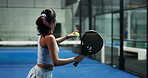 Active, woman and serve with racket for padel games, sports training and practice for competition. Athlete, people and gear with ball for contest performance, match preparation and fitness tournament