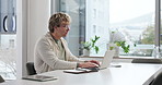 Creative, man and typing on laptop at agency for news report, editing publication or story research. Content writer, planning and tech for writing article draft, proofreading or newsletter submission