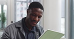 Creative, black man and reading on tablet in office for research, editor feedback and article report. Journalist, digital and notes for story ideas, fact check and draft update for publication agency