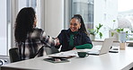 Women, handshake and happy at startup with success, goals or achievement with project at creative agency. Manager, employee and shaking hands for congratulations, thanks or promotion at media company