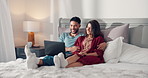 Laptop, laugh and couple on bed in home for streaming subscription, videos and movie. Marriage, happy and man with woman on computer for watching series for bonding, relationship and relax on weekend