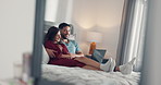Hug, relax and couple on bed on laptop for streaming subscription, videos and movie. Marriage, mirror and man with woman on computer for watching series for bonding, relationship and chill on weekend