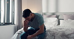 Home, stress and man in bedroom, mental health and pain with anxiety, morning and insomnia. Apartment, tension and person with emotions, sad and burnout with headache, frustrated and upset with grief