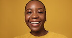 Face, African woman and happy in studio for funny joke, comic story and stress free. Portrait, female person and smile with laugh, positive attitude and expression with good mood on yellow background
