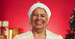 Happy, Christmas and face of old woman in studio for holiday season, retirement and smile. Festive celebration, xmas vacation and December break with elderly person on red background for laugh