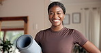 Happy, black woman and face with yoga in home for pilates, exercise or indoor workout. Portrait, female person or African yogi with smile or mat in confidence for healthy balance, fitness or wellness
