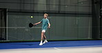 Boy, teenager and playing with bat for padel tennis, indoor sport or practice in club. Male person, child or teen with movement, swing or ball training for beginner match, game or physical exercise