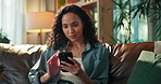 Woman, phone and happy with texting on sofa, contact and web chat for online dating in lounge at home. Person, smartphone and check notification with mobile app, scroll and social network at house