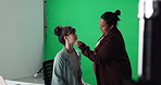 Reporter, prep and woman with green screen for news, journalism and network broadcast in studio. Anchor, journalist and person with makeup artist for media story, announcement and live streaming
