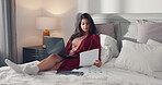 Typing, laptop and documents with woman in bed of home for remote work, blog data and seo research. Freelancer, article performance and update with person in bedroom of apartment for post and stats