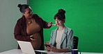 Woman, news reporter and makeup artist with green screen, foundation brush or phone with mock up space. Person, speaker and smile with cosmetics, mobile app and behind the scenes for tv broadcast