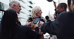 Politician, woman and speaking with journalist for press conference, government policy and opinion. News, politics and talking to reporter for interview, question and announcement with media in city