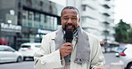 Man, face and reporter in city with broadcast, live or breaking news with ear piece for info. POV, microphone and press in street, mature journalist or black person with headline announcement outdoor