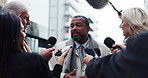 Politician, man and speaking with journalist for press conference, government policy or broadcast. News, politics or talk to reporter for interview, answer question or announcement with media in city