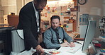 Paperwork, computer and detectives in office with meeting for solving case in collaboration. Documents, team and male private investigators with discussion for briefing on investigation in workplace.