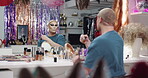 Brush, makeup and mirror with drag performer in studio for contour, lgbt culture and cosmetics. Foundation application, beauty products and queer theater with person in dressing room as artist
