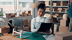 Laptop, documents and woman with boxes for shipping, supply chain and logistics in office. Business, ecommerce and person with paperwork for online inventory, delivery checklist and distribution