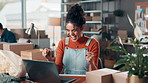 Fist pump, celebration and businesswoman in office with laptop for good news with order confirmation. Happy, cheering and female entrepreneur with computer for startup funding approval in workplace.