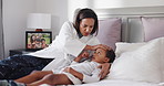 Mom, sick child and bed with fever for healthcare, virus or monitoring flu symptoms in home. Worried mother, kid or checking temperature with rest, thermometer or medical concern for illness in house
