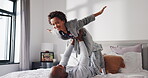 Aeroplane, dad and child in home, playing or fun with son on weekend, family and bonding with father. Happy, black people or game with man in house, smile and lifting kid on break, boy and love