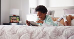 Break, morning and tablet with black child on bed in home for browsing, online gaming or social media. App, relax and smile of happy African boy in bedroom of apartment for internet streaming