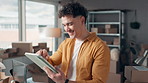 Logistics, cardboard and man with tablet, smile and online order with checklist for inventory. Happy, person and entrepreneur with tech, boxes and small business with digital app and company website
