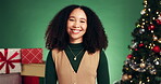 Face, woman and smile on Christmas in studio with gifts, celebration and holiday tradition. Happy, African female person and mockup space at party, xmas season and giving presents on green background