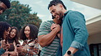 BBQ, conversation and handshake with friends outdoor in backyard of home together for celebration. Cookout, smile and talking with group of people shaking hands in garden for social gathering