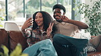 Home, selfie and couple on sofa, peace sign and bonding together in living room. Apartment, people and man on couch, woman and romance with symbol, relationship and profile picture with v gesture