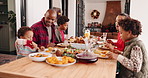 Christmas, parents and eating lunch with kids, talking and happy in family home. Xmas, father and mother with children for food, holiday celebration and teaching etiquette with hungry African people
